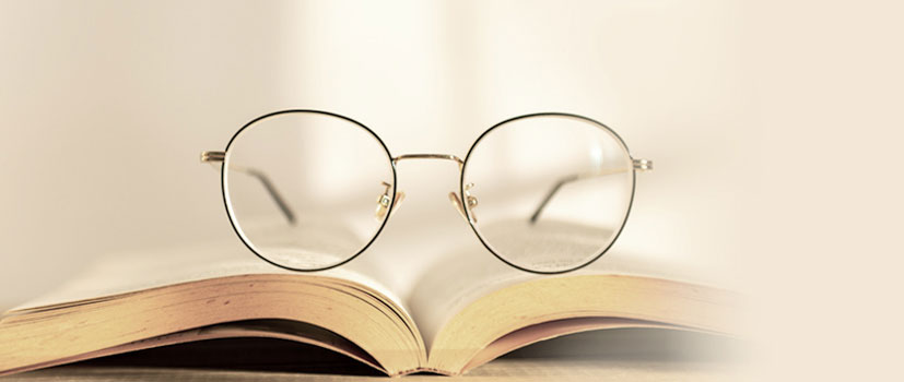 glasses on book